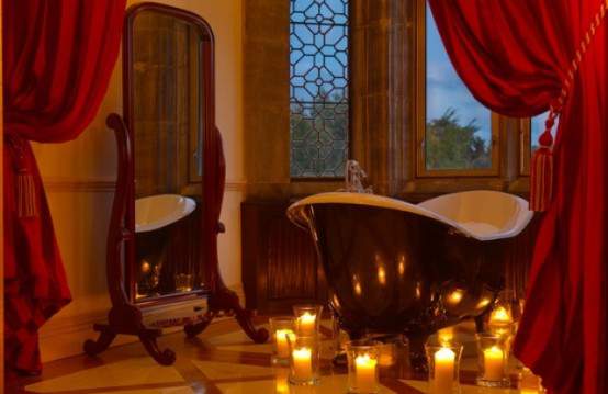 Luxury-Brown-White-Bathtub-Romantic-Bathroom-Decor-With-Candles.-Mirror-And-Red-Curtain